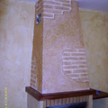 Chimenea con terminacion en efectos decorativos rusticos texturon naturpiedra
