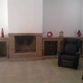 frontal de salon con chimenea y encimera