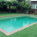 Piscina y jardin