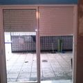 instalación de puerta de aluminio