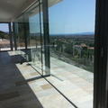Muro cortina con baranda cristal 10+10 exterior