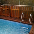 Piscina y valla de madera IPE 
