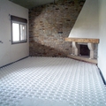 Suelo radiante y chimenea en una casa de 180m2