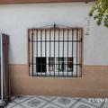 ventana de patio con rejas 