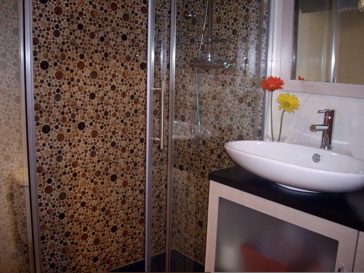 Zona ducha en gresite circulos