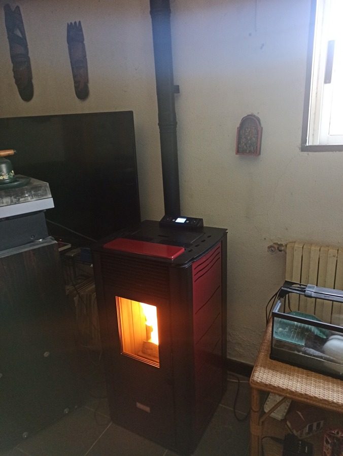 Instalación de estufa de pellets