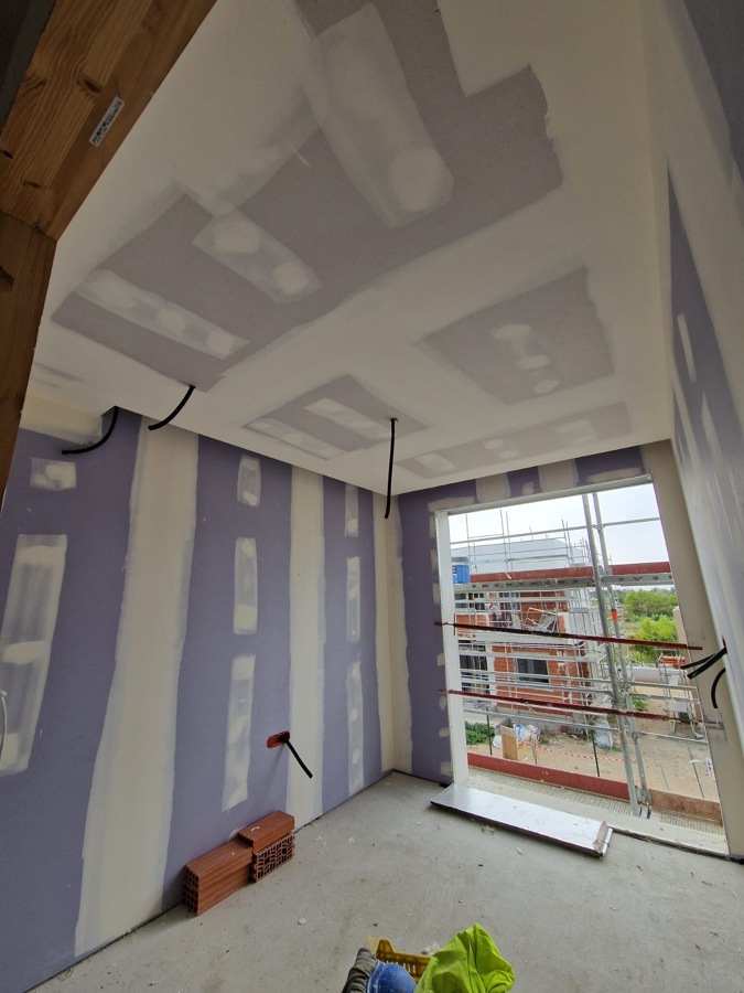 Reforma integral con pladur y acabado moderno.