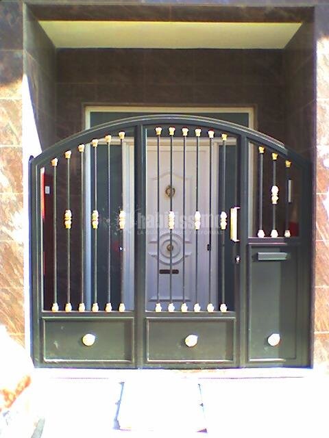 Cancela en comunidad de vecinos