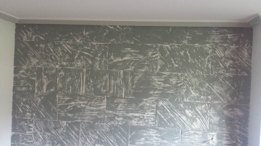 Recreacion o Imitacion a piedra con pintura sobrea una pared