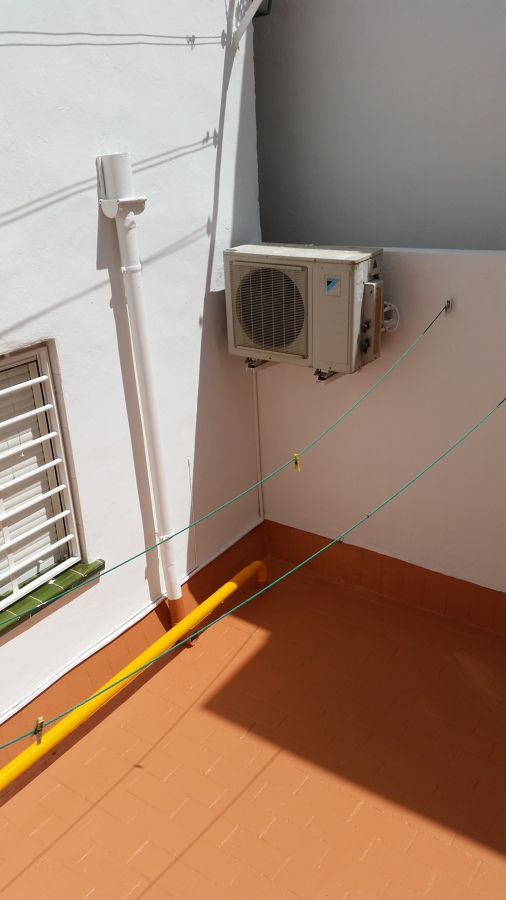 Reparación y pintura de patio interior en planta baja