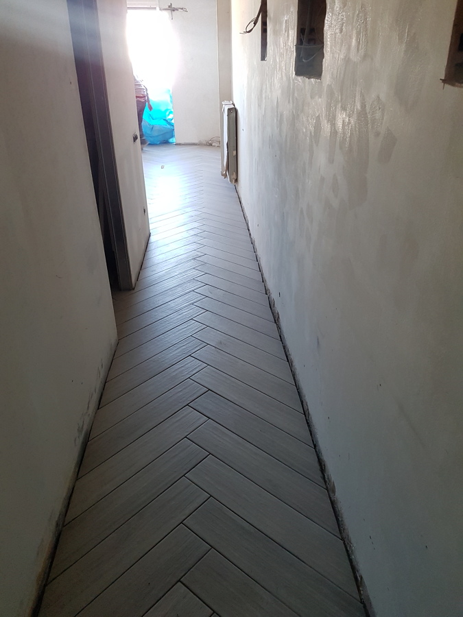 Pavimento a espiga y a cartabón