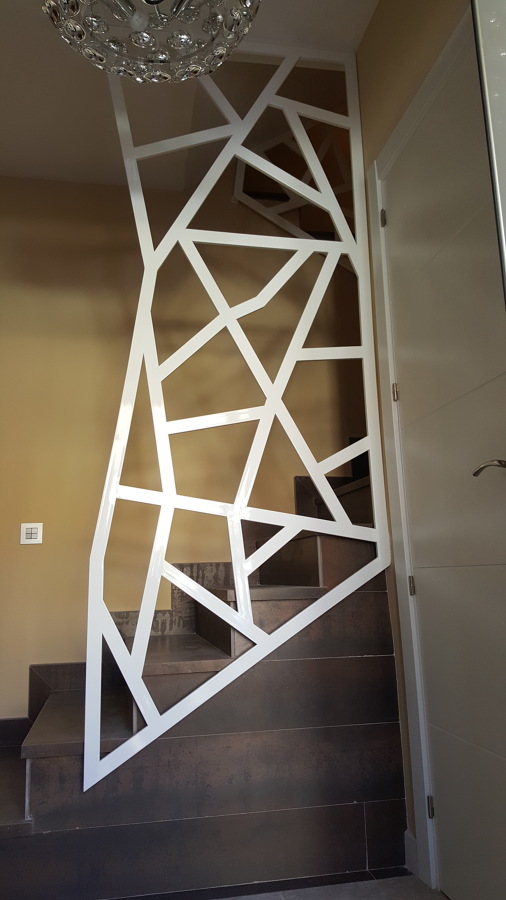 Barandilla en escalera de un chalet