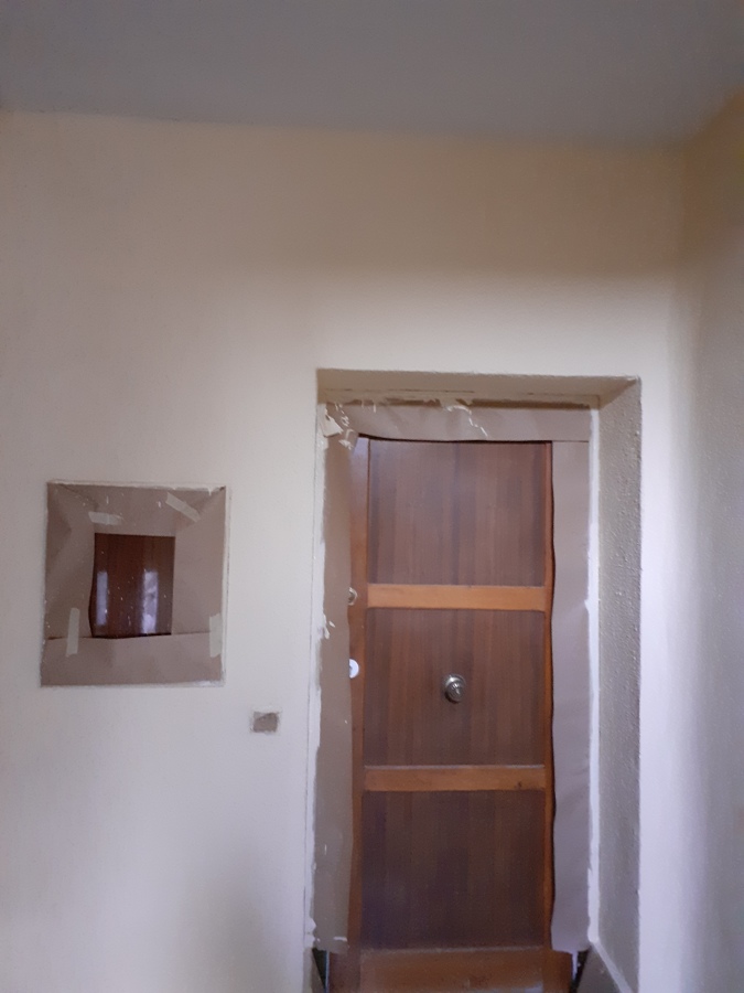 Preparacion de paredes, protección de puertas y ventanas