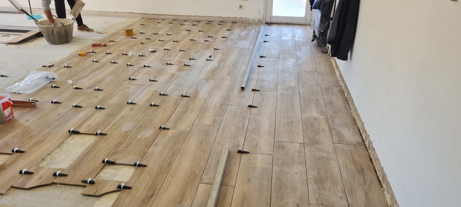 Col.locacion de suelo porcelanico imitación parquet