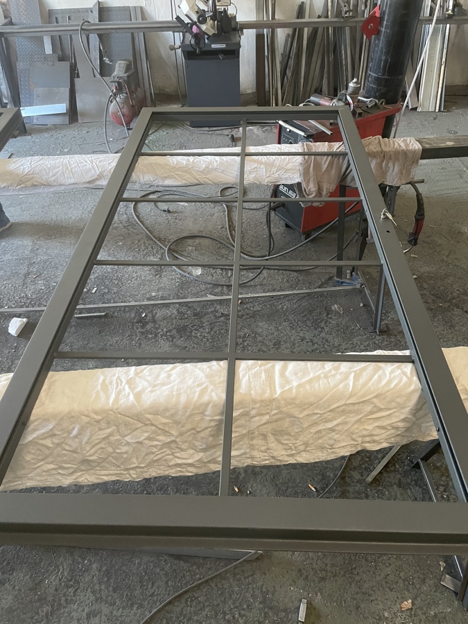 Puerta de cuarterones de cristal