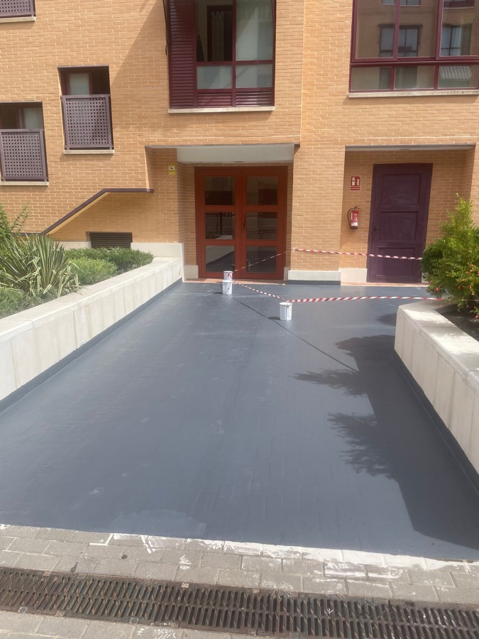 Impermeabilización entrada portal