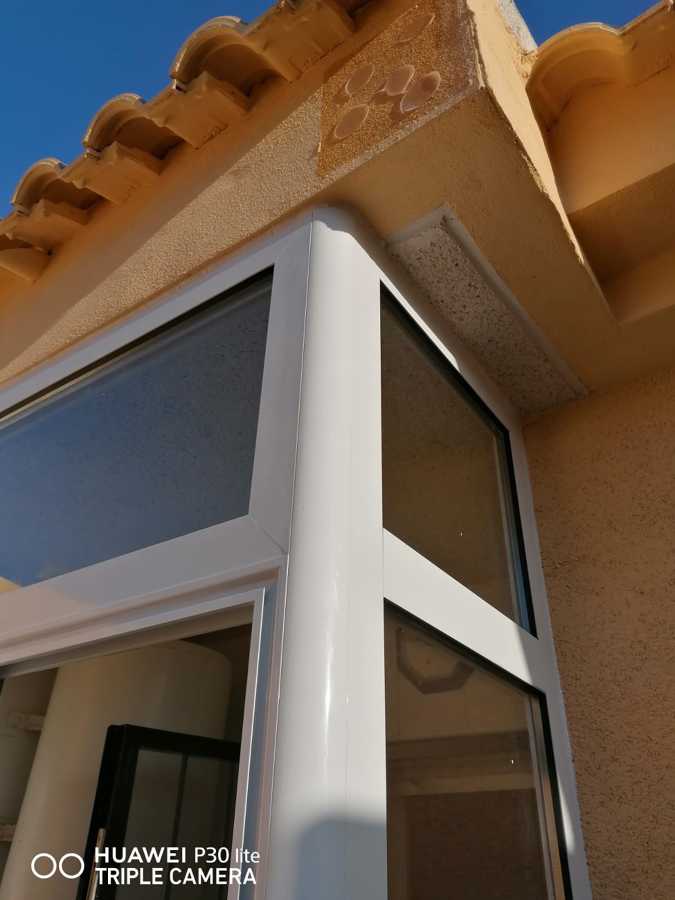 Union fe ventanas columna canto redondeado