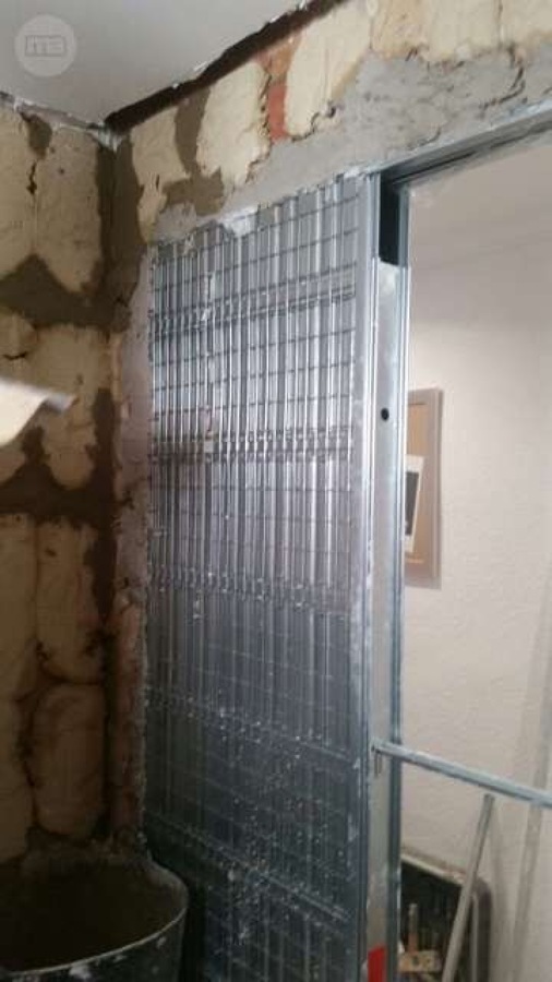 Puerta corredera en potrada