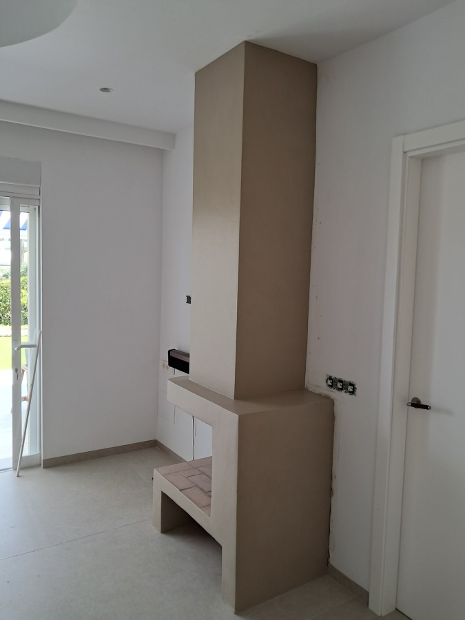 microcemento en chimenea