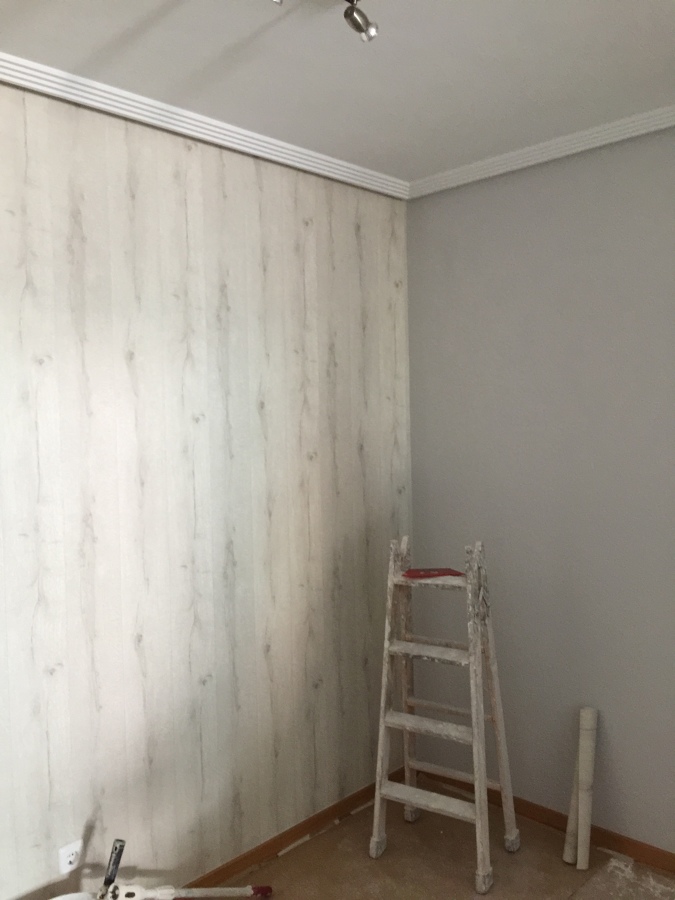 Pintura y colocación de papel