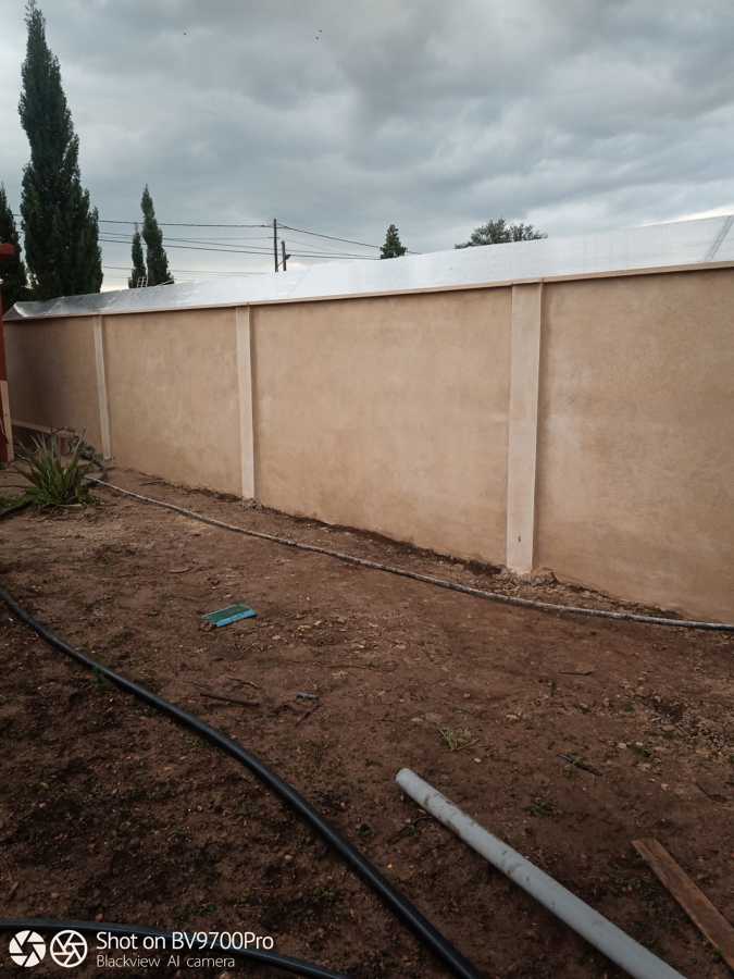 CONSTRUCCION PARED MEDIANERA ENTRE VECINOS