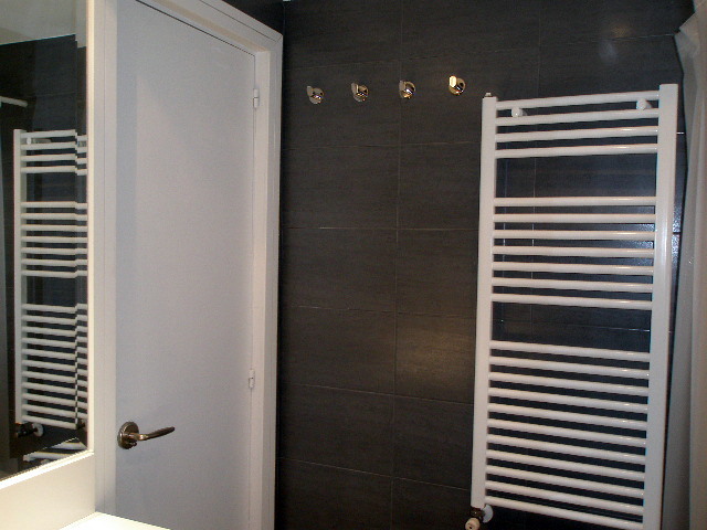 alicatado imiatación pizzara y radiador toallero