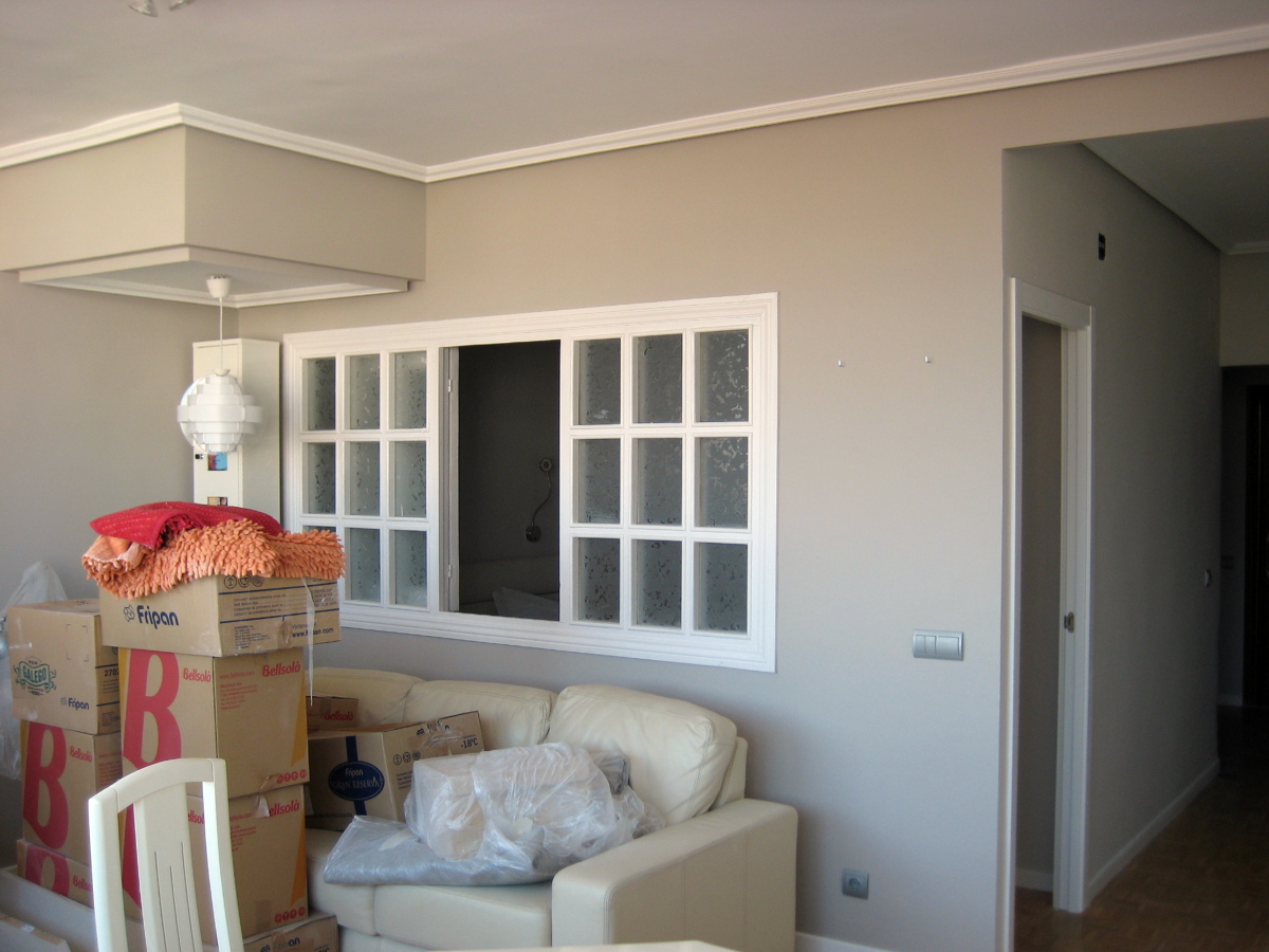 Apertura tabique, colocación ventana acristalada