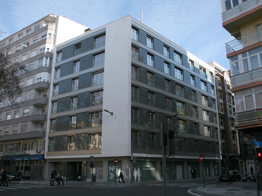 Construcción y promoción de 18 viviendas, locales y garaje