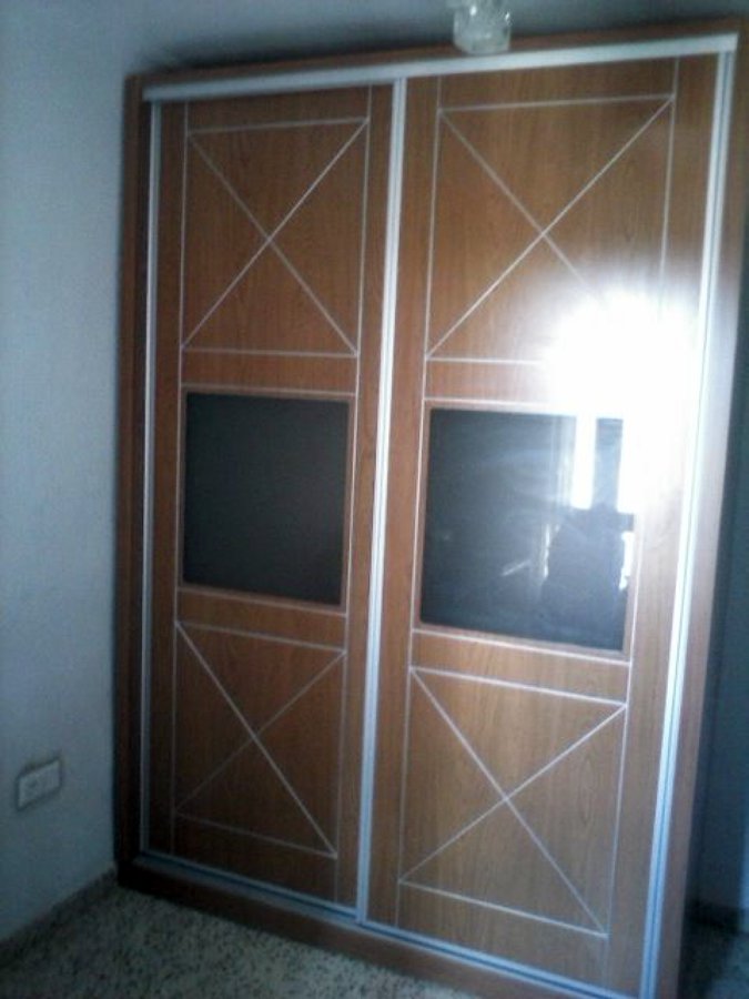 armario puertas abatibles pantografiadas y cristaleras