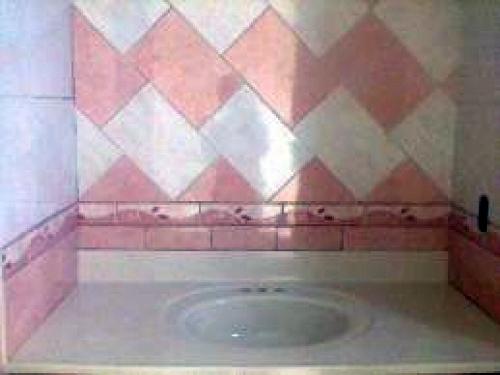 Baño con diseño a cartabon