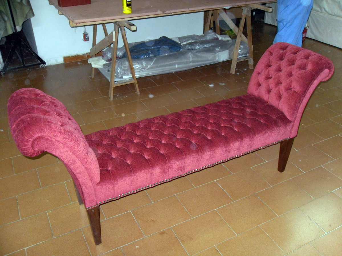 banqueta con brazos capitone