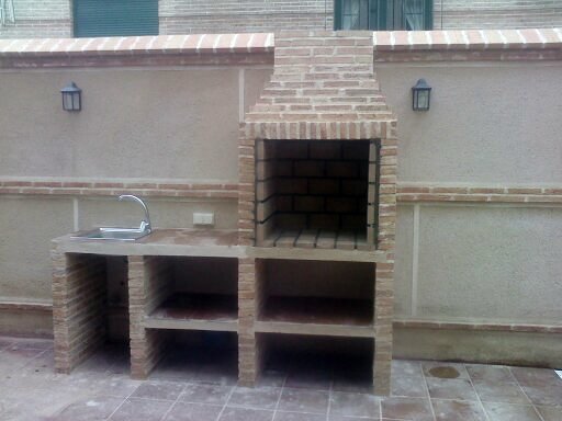 barbacoa con mesa y fregadero