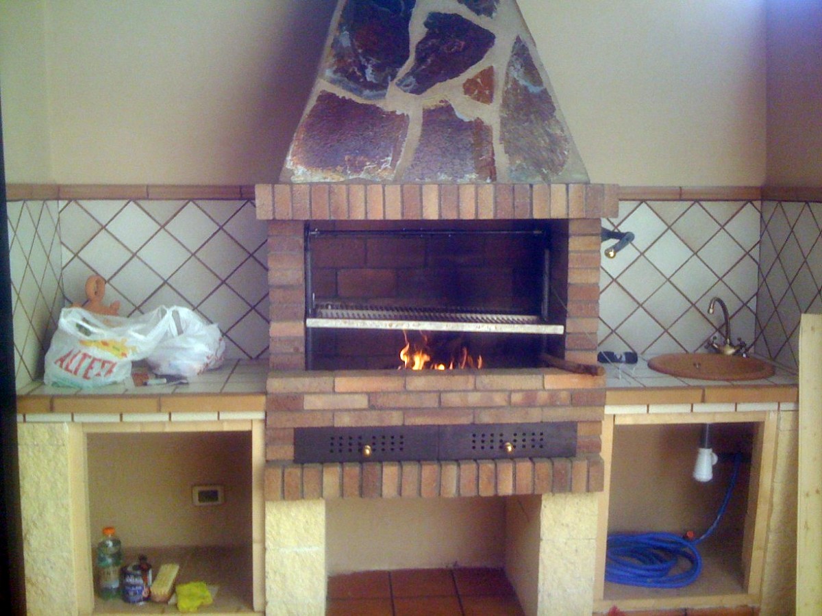 barbacoa, pérgola y encimera fundida