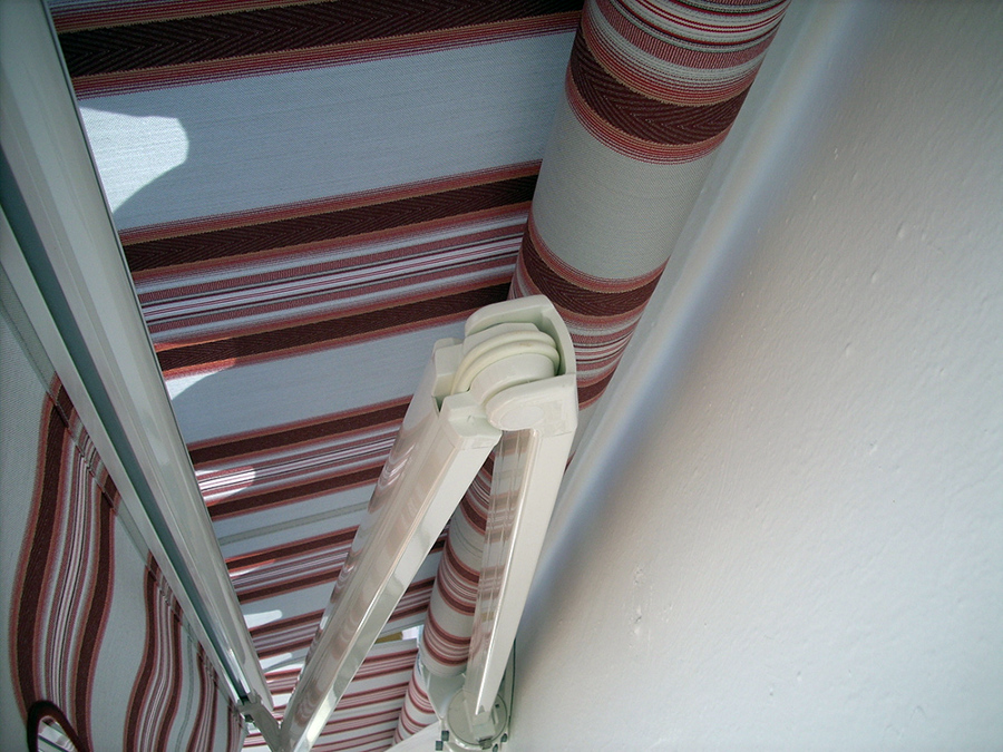 brazos de toldo articulado