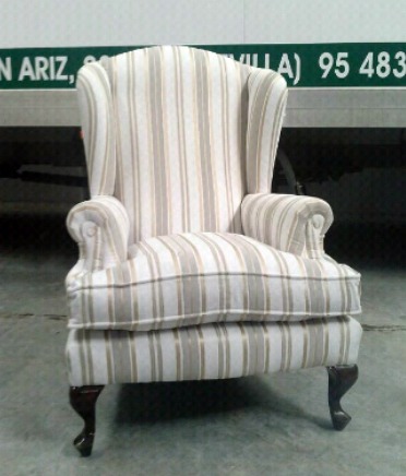 Butaca clásica orejera.
