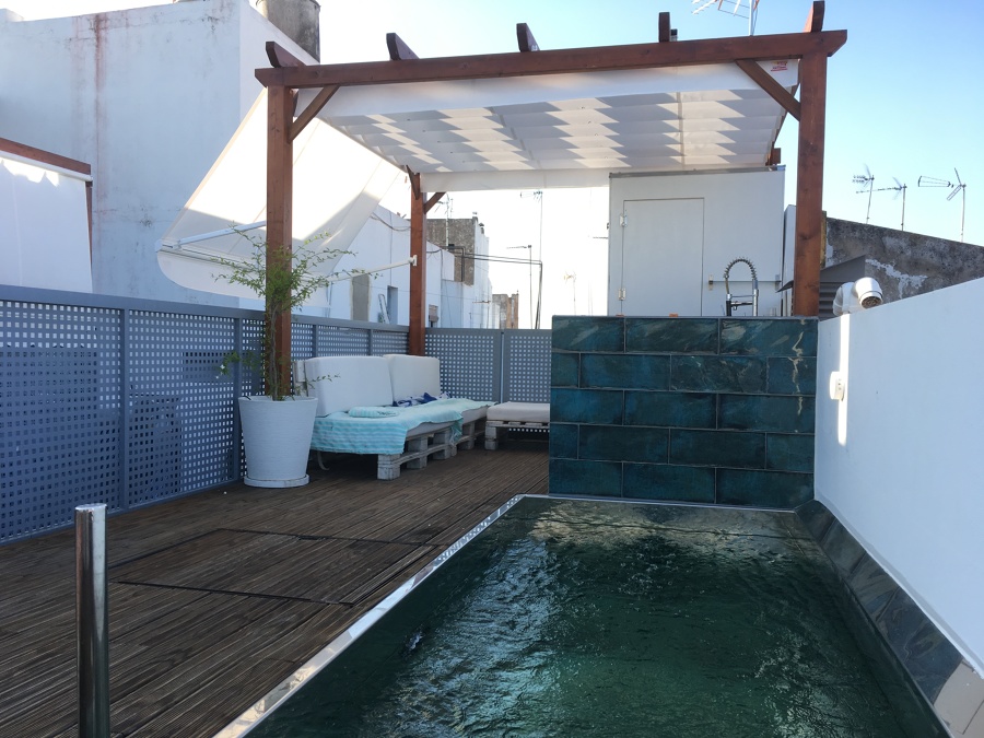 Pérgola con toldo de palilleria