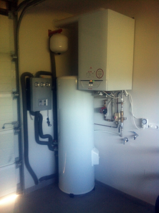 CALDERA DE CONDENSACION Y ENERGIA SOLAR TERMICA