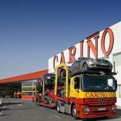 Camión Portavehículos saliendo de la campa