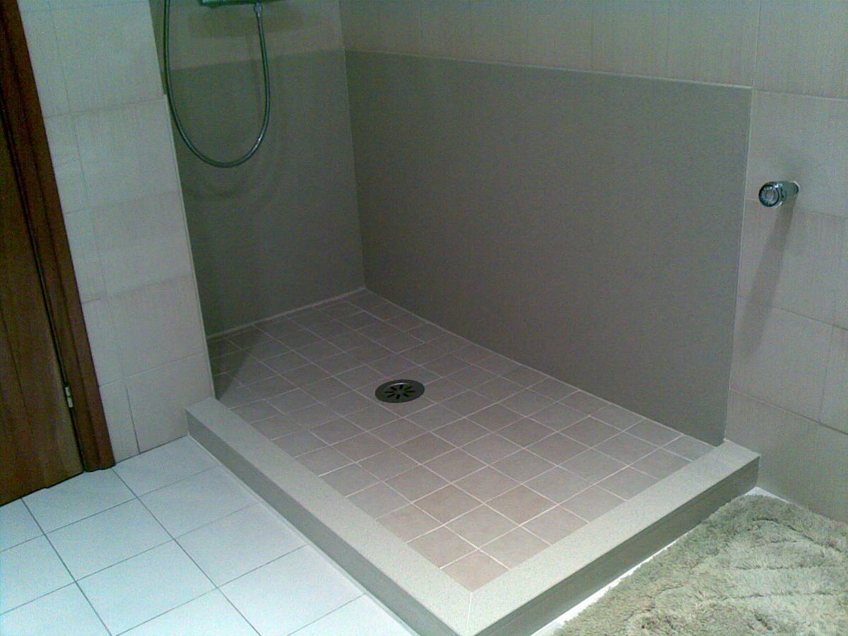 Canvi de banyera a plat de dutxa d'obra