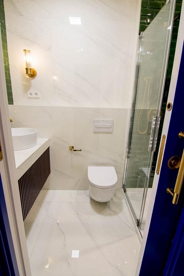 Baño principal con porcelánicos de Inalco