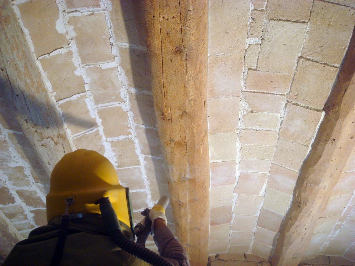 Chorreo en vigas de madera