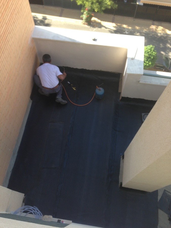 COLOCACIÓN DE TELA ASFALTICA