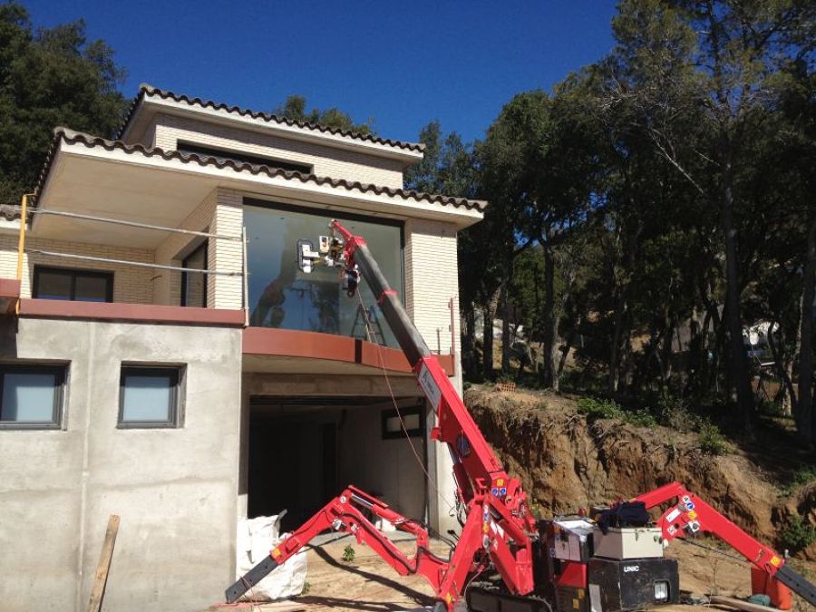 Colocación vidrio con grúa