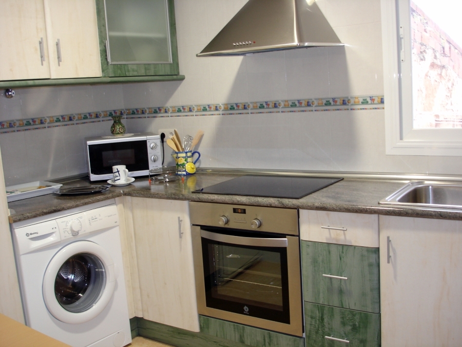 Construcción de cocina y colocación de muebles de cocina