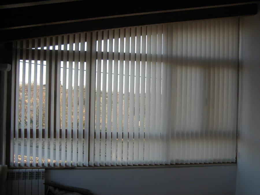 Cortina lamas verticales