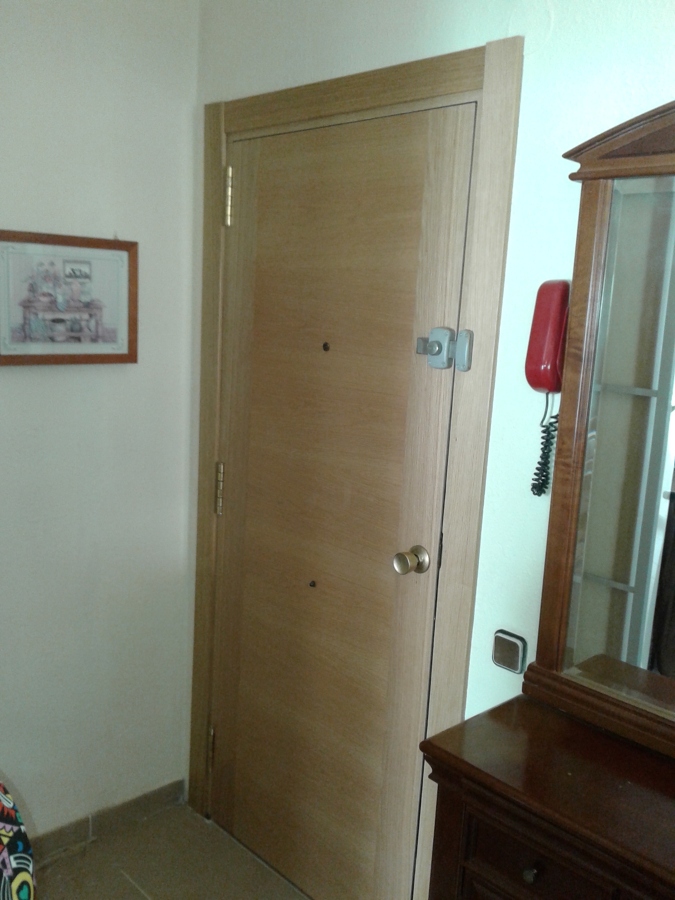 rechapar puerta blindada