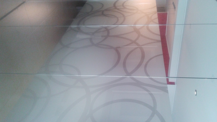 Divisoria cristal con laminar y vinilo impreso