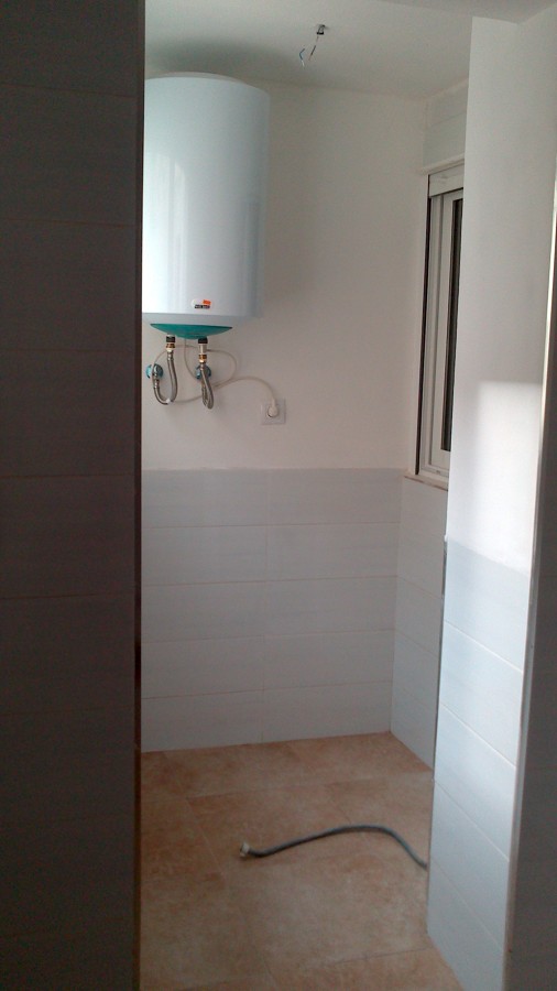 Acabado alicatado y grifería