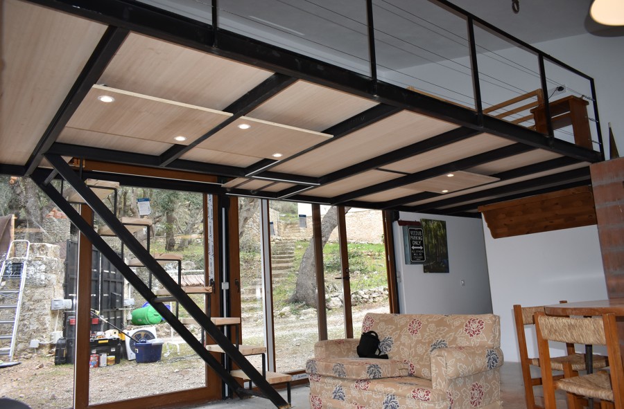 Garaje convertido en una vivienda estilo Industrial