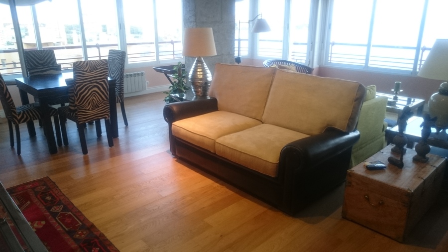 Sofa en piel y tegido sntimanchas